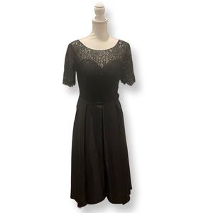 Woman’s lace appliqué formal evening gown A-line satin with pockets.